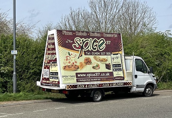 The banner van for the Spice takeaway in Yate