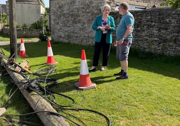 Thornbury & Yate MP Claire Young and a resident next to the downed telegraph pole